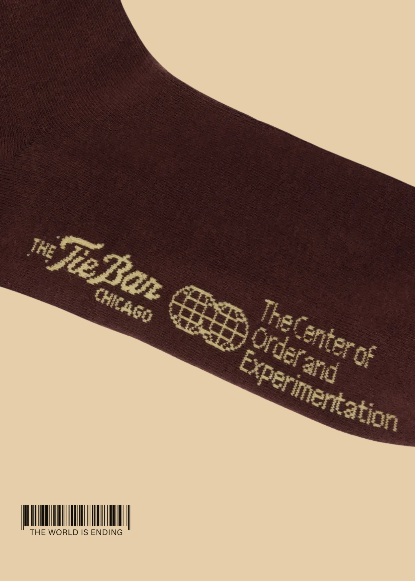THE CENTER OF ORDER AND EXPERIMENTATION x THE TIE BAR THE INDEX BURGUNDY SOCK