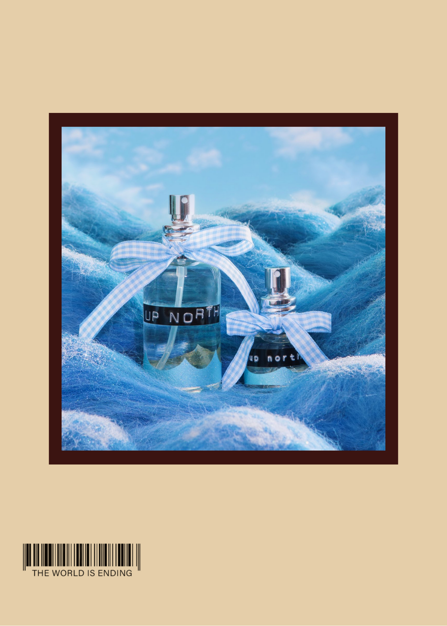 Two perfume bottles with blue ribbons on a blue textured background