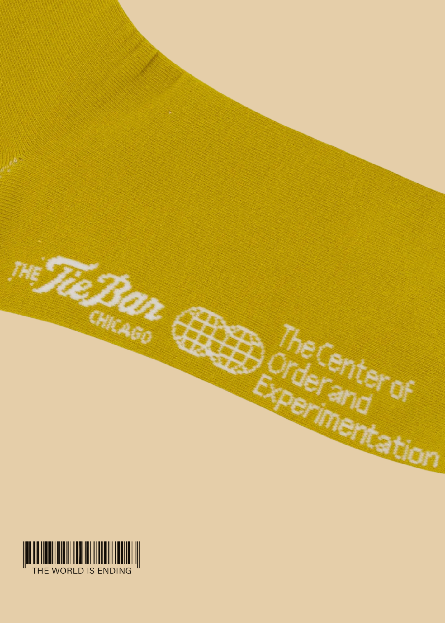 THE CENTER OF ORDER AND EXPERIMENTATION x THE TIE BAR THE INDEX OCHRE SOCK