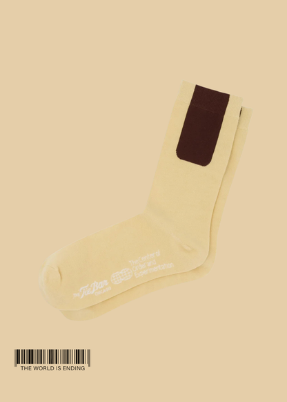 THE CENTER OF ORDER AND EXPERIMENTATION x THE TIE BAR THE INDEX CREAM SOCK