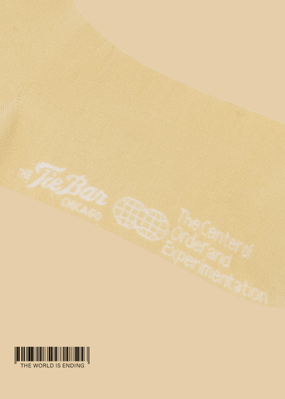 THE CENTER OF ORDER AND EXPERIMENTATION x THE TIE BAR THE INDEX CREAM SOCK