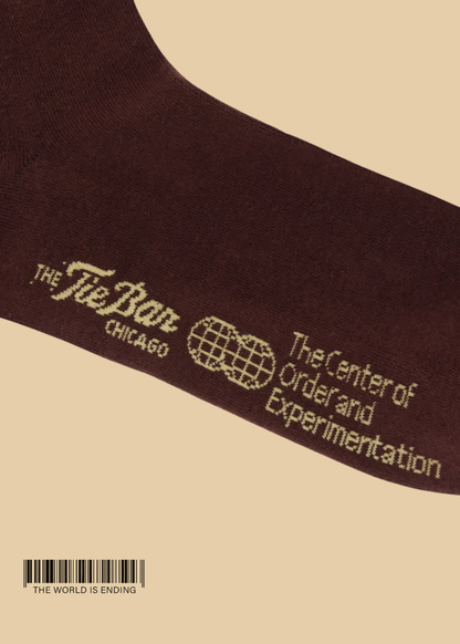 THE CENTER OF ORDER AND EXPERIMENTATION x THE TIE BAR THE INDEX BURGUNDY SOCK