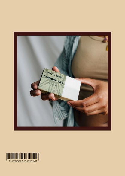 Person holding a bar of soap labeled 'Diamond Day' against a neutral background.